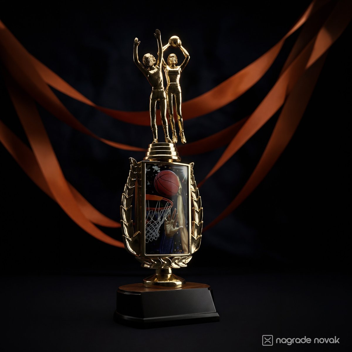 Gold basketball figurine trophy on a black base with orange ribbons draped around it