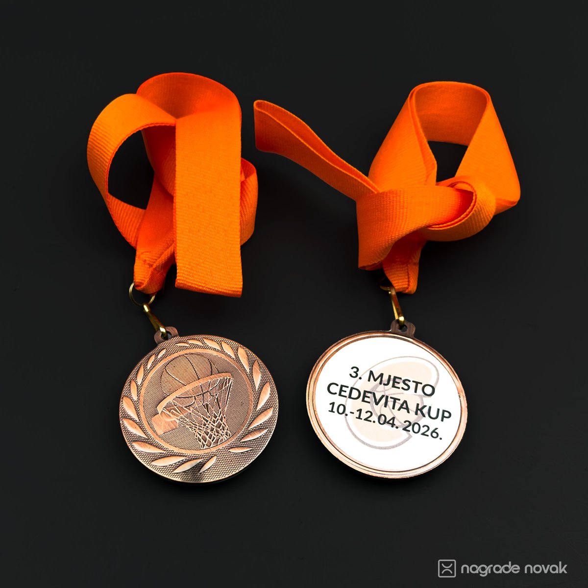 Bronze basketball medal and its printed reverse side reading 3rd place, Cedevita Cup, on orange ribbons