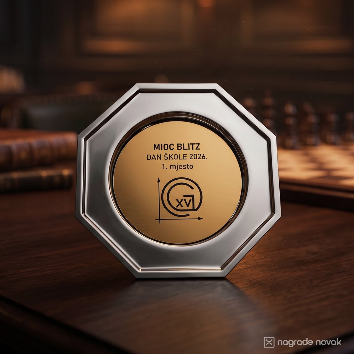 Octagonal silver plate award with a gold insert reading "MIOC BLITZ, DAN ŠKOLE 2026., 1. mjesto", standing on a dark wooden table in front of a blurred chessboard and old books